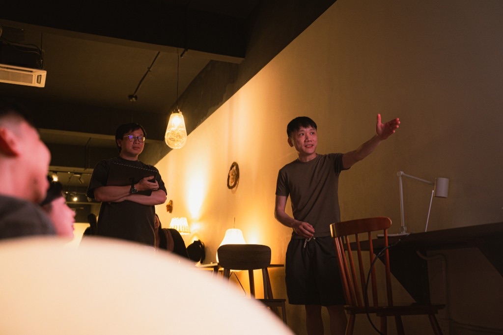 Gesturing toward the audience