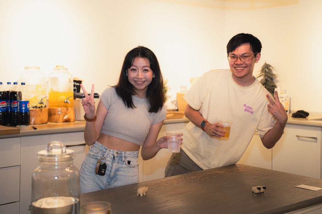 Peace signs by the drinks table